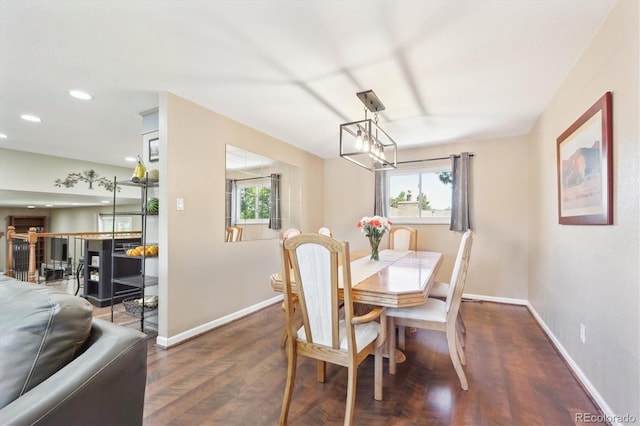 13266 Canopus Dr, Lone Tree, CO 80124 - dining area featuring baseboards, dark wood finished floors, plenty of natural light, and recessed lighting
