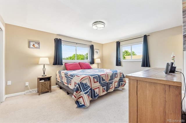 13266 Canopus Dr, Lone Tree, CO 80124 - bedroom featuring light carpet and baseboards