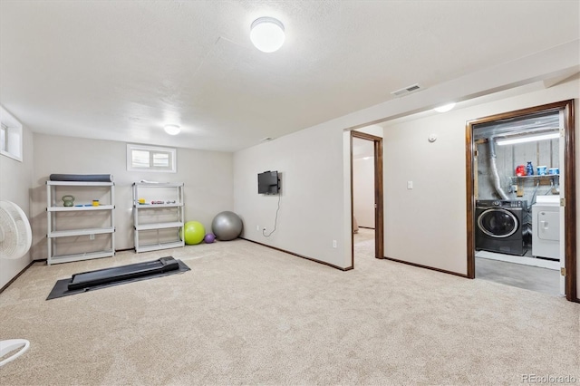 13266 Canopus Dr, Lone Tree, CO 80124 - exercise area featuring independent washer and dryer, carpet flooring, and baseboards