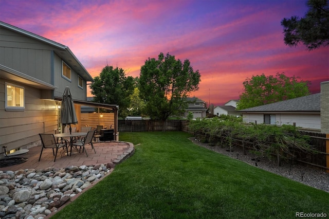 13266 Canopus Dr, Lone Tree, CO 80124 - yard at dusk featuring a patio area