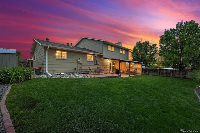 13266 Canopus Dr, Lone Tree, CO 80124 - back of property with a patio area and a chimney