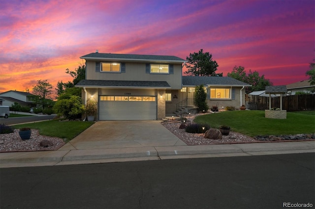 13266 Canopus Dr, Lone Tree, CO 80124 - traditional home with an attached garage, concrete driveway, and brick siding