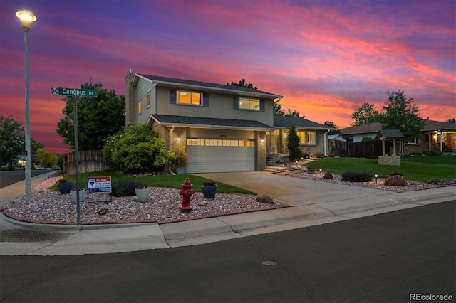 13266 Canopus Dr, Lone Tree, CO 80124 - traditional-style house featuring an attached garage and driveway