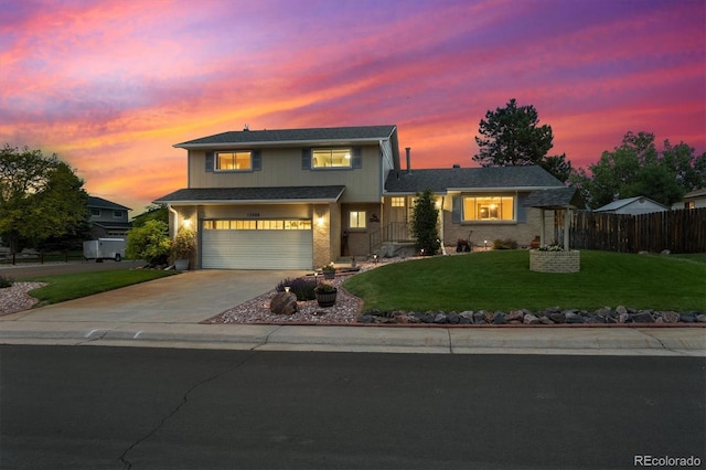 13266 Canopus Dr, Lone Tree, CO 80124 - traditional home featuring an attached garage, driveway, and brick siding