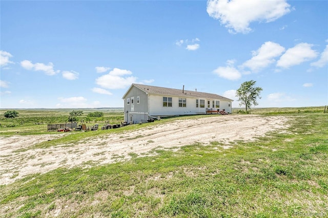 21494 Way Of Peace, Deer Trail, CO 80105 - back of house featuring a rural view