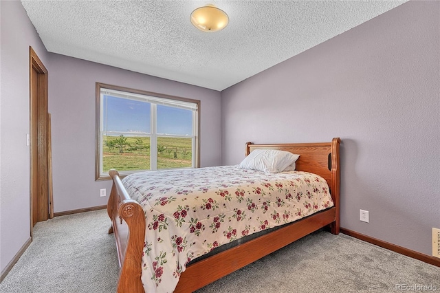 21494 Way Of Peace, Deer Trail, CO 80105 - bedroom with carpet flooring and a textured ceiling