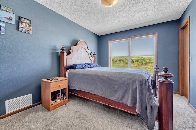 21494 Way Of Peace, Deer Trail, CO 80105 - bedroom with carpet floors and a textured ceiling