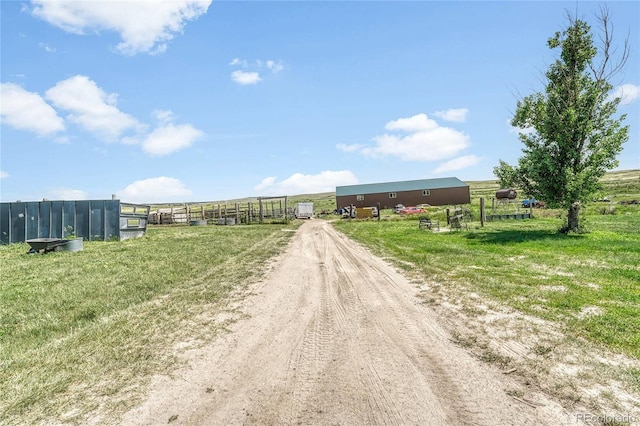 21494 Way Of Peace, Deer Trail, CO 80105 - view of dirt / gravel driveway featuring a rural view