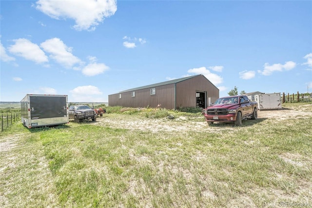 21494 Way Of Peace, Deer Trail, CO 80105 - view of yard with a pole building and an outdoor structure