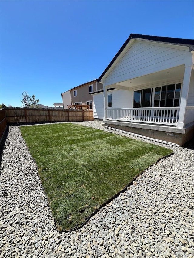 view of yard featuring a fenced backyard and a patio