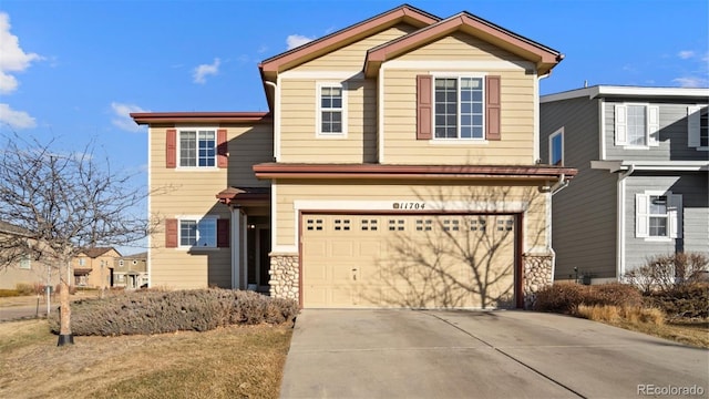 view of front of house with a garage