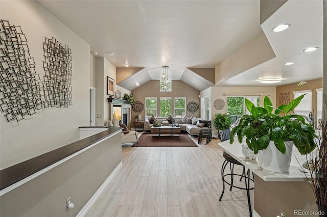 7548 S Biloxi Way, Aurora, CO 80016 - living room with wood finished floors and recessed lighting