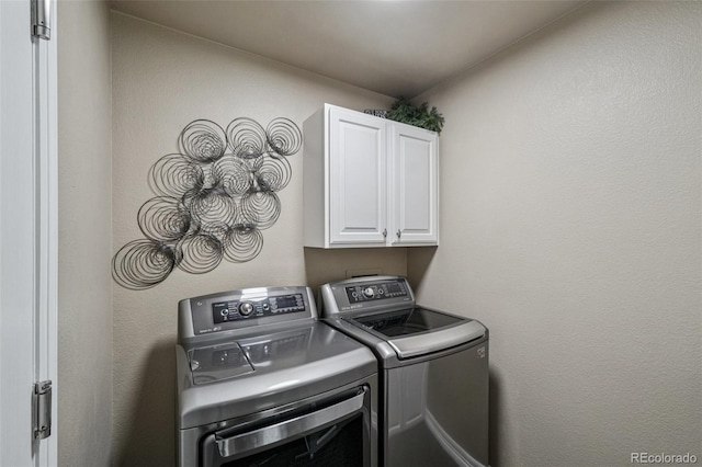 7548 S Biloxi Way, Aurora, CO 80016 - laundry room featuring cabinet space and separate washer and dryer