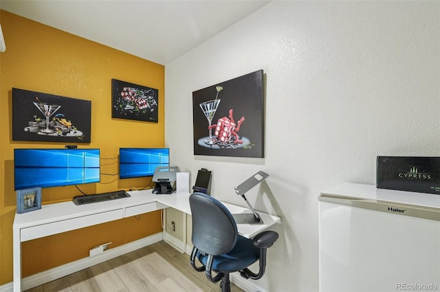 7548 S Biloxi Way, Aurora, CO 80016 - office featuring light wood-type flooring and built in study area