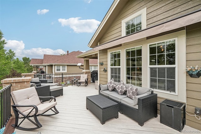 7548 S Biloxi Way, Aurora, CO 80016 - deck featuring an outdoor hangout area