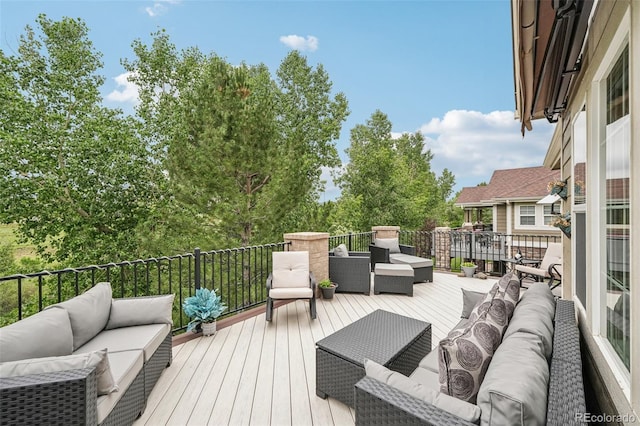 7548 S Biloxi Way, Aurora, CO 80016 - wooden terrace with outdoor lounge area