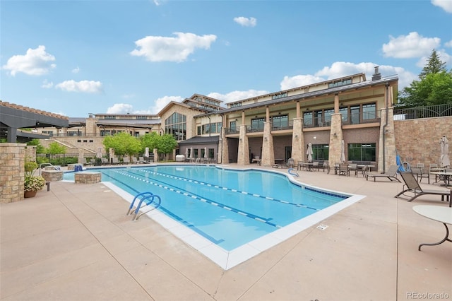 7548 S Biloxi Way, Aurora, CO 80016 - community pool featuring a patio area