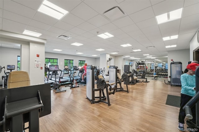 7548 S Biloxi Way, Aurora, CO 80016 - gym featuring light wood-style flooring and a drop ceiling