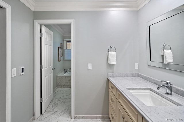 bathroom with marble look tiles, vanity, ornamental molding, baseboards, and a garden tub