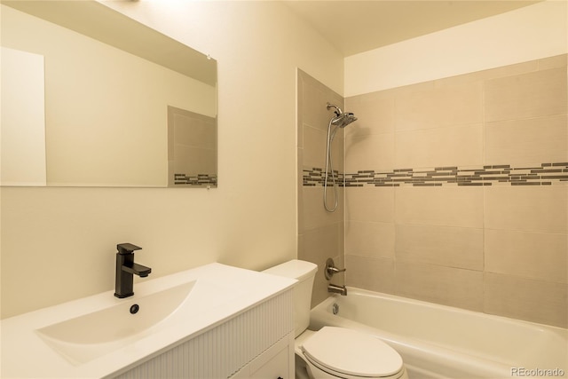 full bathroom featuring shower / washtub combination, vanity, and toilet