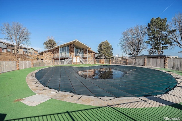 view of swimming pool featuring a fenced in pool and a fenced backyard