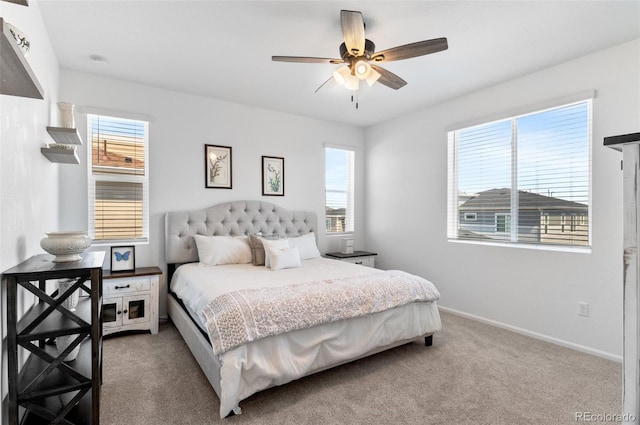 22826 E Tufts Pl Unit A, Aurora, CO 80015 - bedroom with carpet, multiple windows, and a ceiling fan