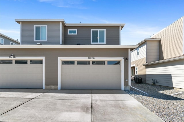 22826 E Tufts Pl Unit A, Aurora, CO 80015 - view of front facade with an attached garage and concrete driveway