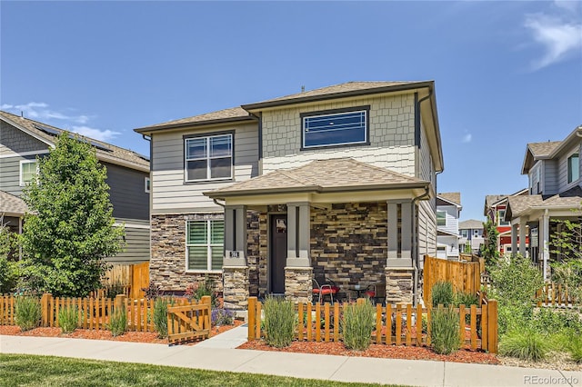 764 N Quatar St, Aurora, CO 80018 - craftsman inspired home featuring stone siding and roof with shingles