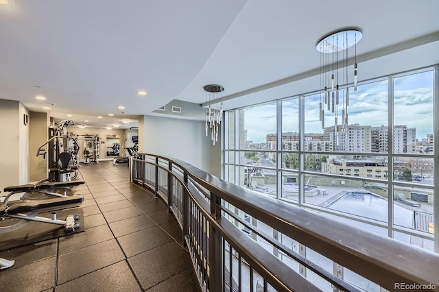 2001 Lincoln St Unit 2213, Denver, CO 80202 - workout area with a city view, healthy amount of natural light, and recessed lighting