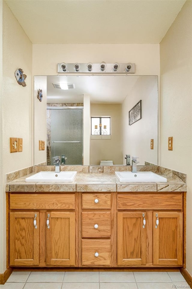 142 Summit Way, Bailey, CO 80421 - full bath featuring double vanity, a stall shower, and tile patterned floors