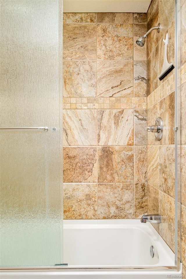 142 Summit Way, Bailey, CO 80421 - bathroom featuring shower / washtub combination