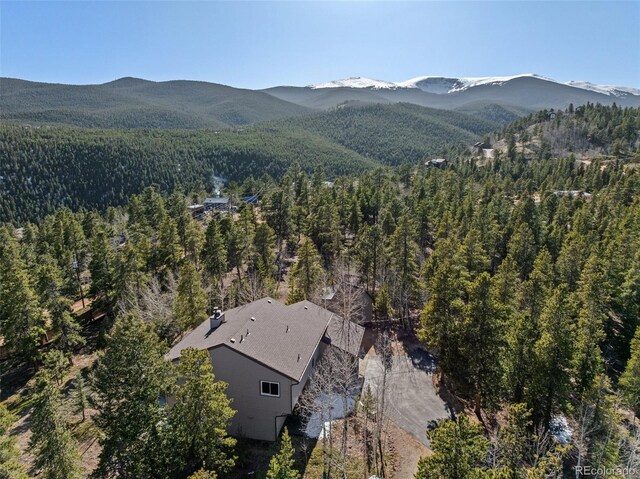 381 Highlands Dr, Bailey, CO 80421 - drone / aerial view featuring a mountain view and a wooded view