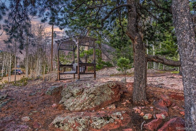 381 Highlands Dr, Bailey, CO 80421 - view of yard with a pergola