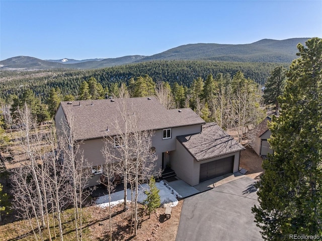 381 Highlands Dr, Bailey, CO 80421 - aerial view featuring a mountain view and a view of trees
