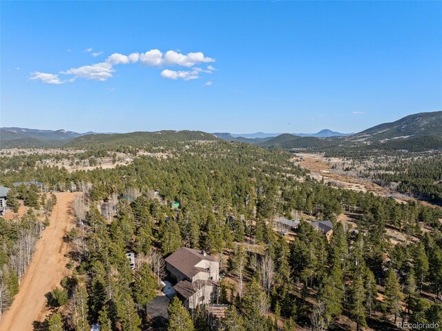381 Highlands Dr, Bailey, CO 80421 - birds eye view of property featuring a mountain view and a wooded view