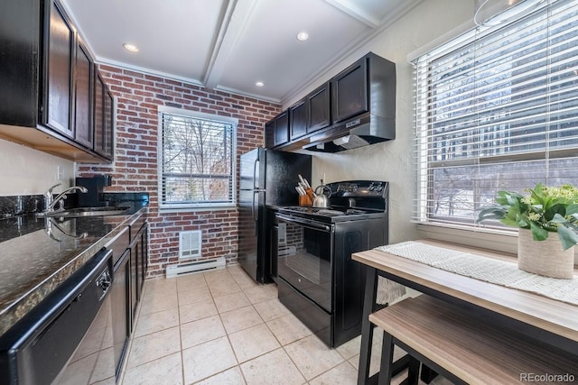 kitchen featuring a sink, light tile patterned flooring, black appliances, baseboard heating, and brick wall