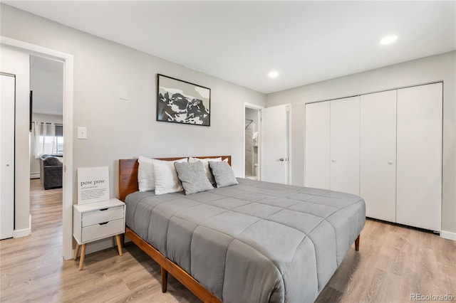 370 E Ln Bonte St Unit 502, Dillon, CO 80435 - bedroom featuring light wood-style flooring, recessed lighting, a closet, and baseboards