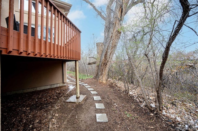 view of yard with a deck