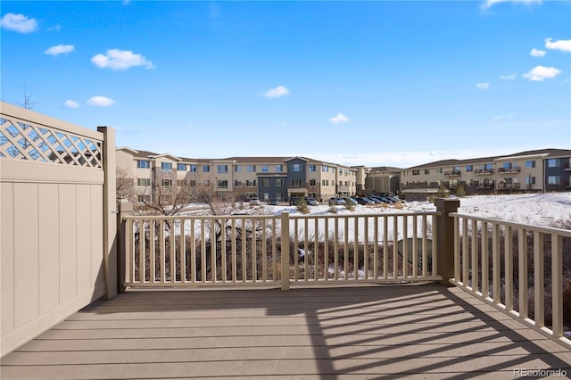 view of snow covered deck