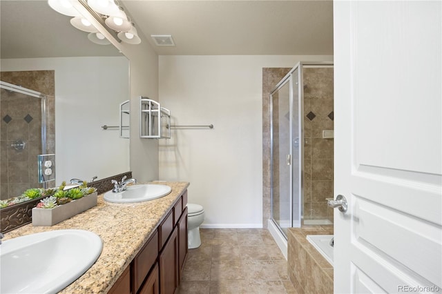 full bathroom with vanity, independent shower and bath, and toilet