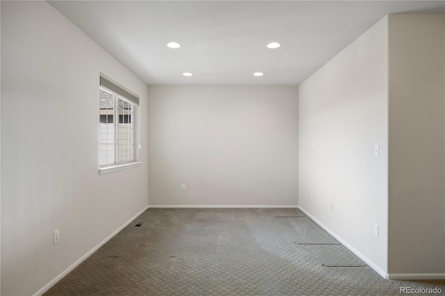 view of carpeted spare room