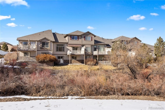 view of snow covered property