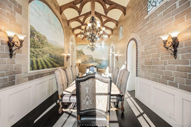 dining space with a chandelier