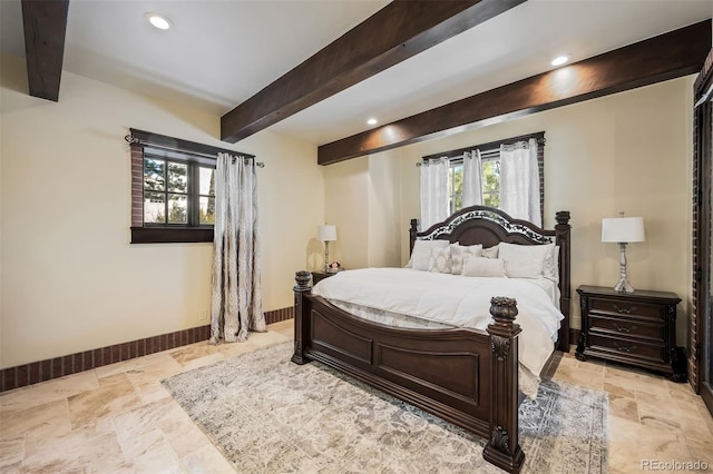 bedroom featuring beam ceiling