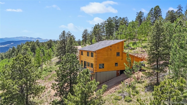 exterior space featuring a mountain view