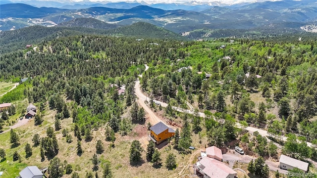 drone / aerial view featuring a mountain view