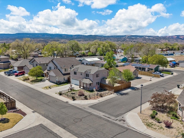birds eye view of property featuring a residential view and a mountain view