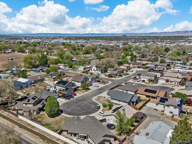 drone / aerial view with a mountain view and a residential view