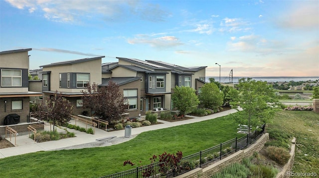 10066 Belvedere Cir, Lone Tree, CO 80124 - property exterior at dusk featuring stucco siding