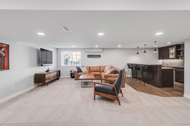 living room featuring light carpet and indoor bar